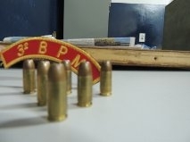06 munies de calibre 9 mm de uso restrito